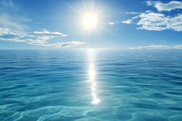 Fototapeta premium Serene Ocean with Clear Blue Waters and Bright Sunlight, Reflecting Light on the Horizon with Scattered White Clouds