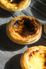 Pastel de Nata are also commonly known as Portuguese Custard Tarts. Close up