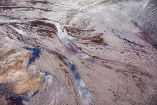 Africa, Kenya, Magadi, Aerial view of shallow river drainage along shores of Lake Magadi in Rift Valley