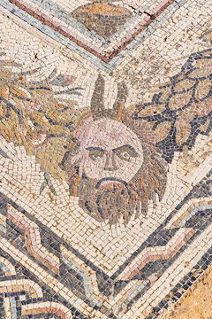 Ben Arous, Tunisia. Roman mosaic floor with the head of a satyr at the Uthina Archaeological Site.
