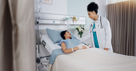 Women, doctor and patient in bed with smile at hospital for checkup, good news and feedback....