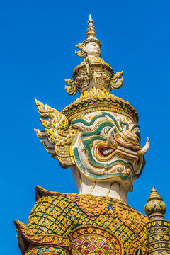 White guardians statue, Grand Palace, Bangkok, Thailand. Palace was home of King of Thailand from 1782 to 1925