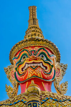 Red guardians statue, Grand Palace, Bangkok, Thailand. Palace was home of King of Thailand from 1782 to 1925