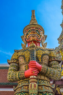 Red guardians statue, Grand Palace, Bangkok, Thailand. Palace was home of King of Thailand from 1782 to 1925