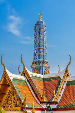 Colorful Porcelain Stupa Prang roofs, Grand Palace, Bangkok, Thailand. One of eight towers for different Buddhist sects, palace was home of King of Thailand from 1782 to 1925