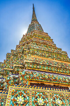 Colorful ceramic Chedi spire pagoda, Wat Pho Temple, Bangkok, Thailand. Built in 1600's. One of the oldest temples in Thailand.