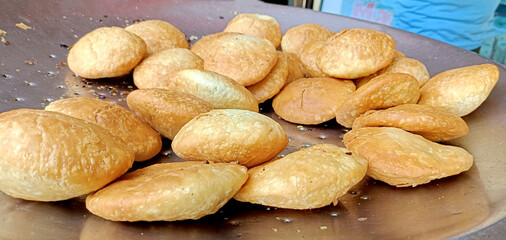 Indian famous delicious street food onion kachori display at sho