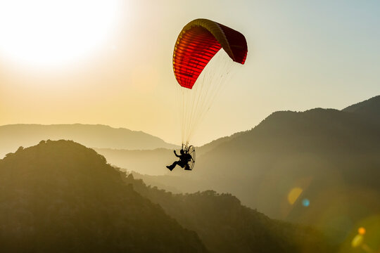 Paramotor pilot flying in Dalyan, Mugla, Turkey. (MR)