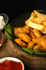 Homemade chicken nuggets with fries