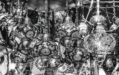 Black and white Turkish traditional lamps, Grand Bazaar, Istanbul, Turkey. Traditional mosaic lamps were in Turkish mosques and tombs. Light represents divine presence and light of Koran.
