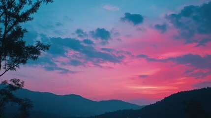 Pink and blue sunset over mountains