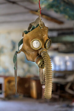 Ukraine, Pripyat, Chernobyl. Gas mask hanging from a wire.