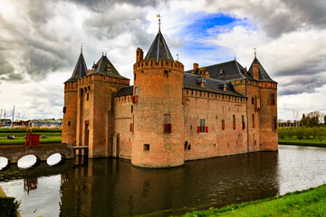 Netherlands, Muiden. Muiderslot Castle located on Vecht River. Fortress for water defense.