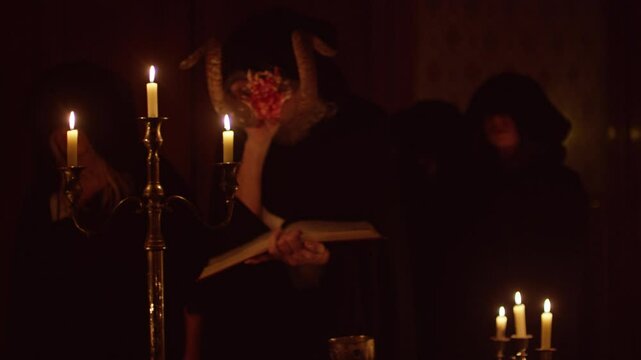 Woman in white laying on the floor during a ceremony