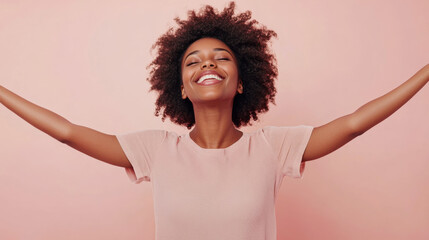 Young black African woman with open arms isolated on pink background , studio shot of a beautiful afro American girl with happy smiling face welcome with open arms on pale pink color backdrop