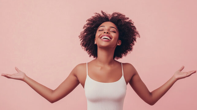 Young black African woman with open arms isolated on pink background , studio shot of a beautiful afro American girl with happy smiling face welcome with open arms on pale pink color backdrop