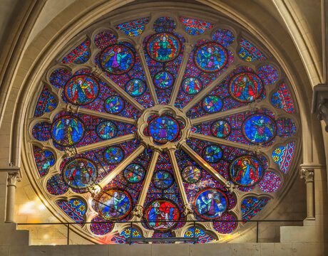 Jesus Christ and angels stained glass rose window, Lyon Cathedral, France. Cathedral begun in 1180 and finished in 1480.