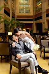 A beautiful couple in love against the backdrop of a Ferris wheel. The bride and groom
