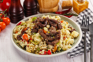 Traditional couscous with beef and vegetables