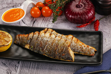 Grilled seabass fillet with lemon