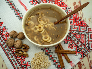 bowl with romanian traditional food known as mucenici muntenesti, served on 9th of March for...