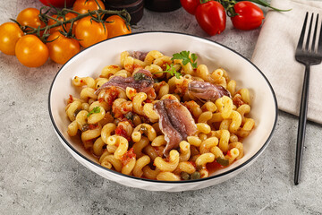 Italian pasta cellentani with anchovy