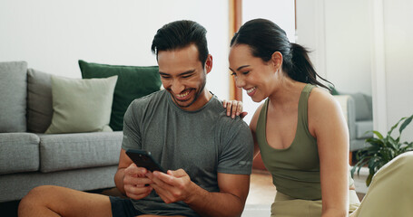 Fototapeta premium Relax, phone and happy couple in home for social media, online shopping and payment on app. Man, woman and mobile in living room for conversation, account review and check credit score on internet