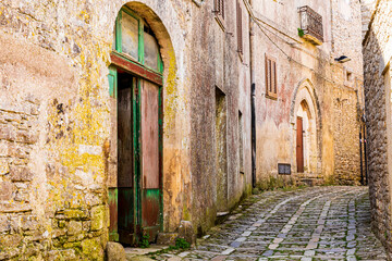 Italy, Sicily, Trapani Province, Erice. Narrow streets and arched doorways in Erice.