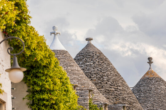 Italy, Apulia, Metropolitan City of Bari, Alberobello. Trulli houses, traditional Apulian stone huts with a conical roof.