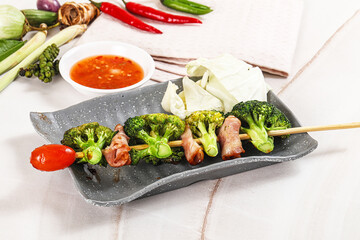 Thai Street foof satay with bacon and broccoli