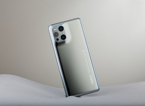 Mansfield,Nottingham,United Kingdom,21st August 2024:Studio product image of Oppo Find X3 Pro mobile phone,The company is owned by BBK Electronics.