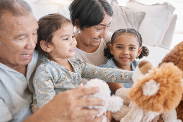 Family, grandparents or kids in home with teddy bear, happiness or bonding on sofa. Children,...