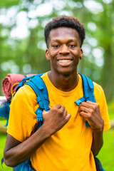 African backpacker enjoying adventure in natural park