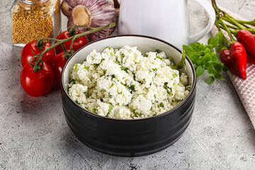 Curd cheese with green herbs