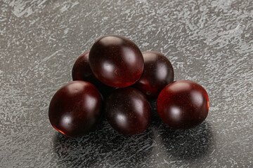 Raw ripe black kumato tomato