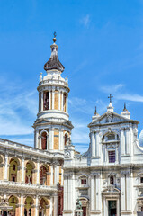Stunning architecture of the Basilica of the Holy House in Loreto under a bright blue sky. Loreto, Marche, Italy