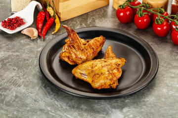 Tasty roasted chicken wing with spices