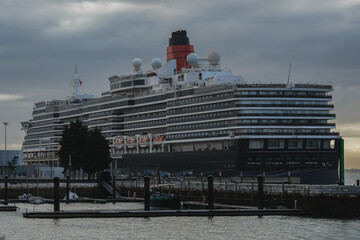 Luxury ocean liner cruiseship cruise ship Queen Victoria in port in sunny blue sky Lisbon, Portugal...