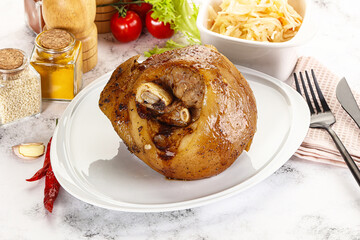 Baked pork knee with spices