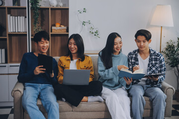 Young friends doing school assignment together at home