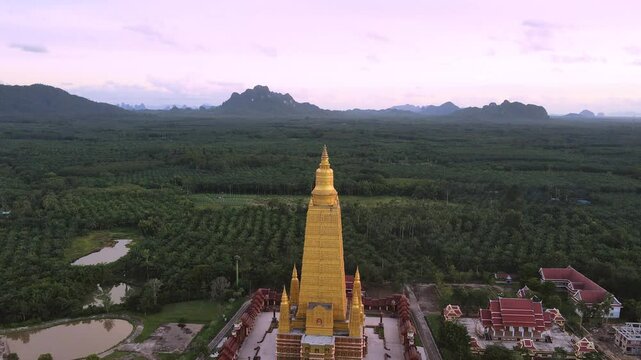 Drone video, high angle, Wat Mahathat Wachira Mongkhon (Wat Bang Thong), Krabi Province, 46 Moo 3, Na Nuea Subdistrict, Ao Luek District, Krabi 81110 Thailand.