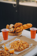 Group of young friends eating pizza.Home party.