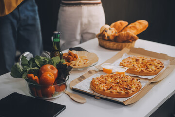 Group of young friends eating pizza.Home party.