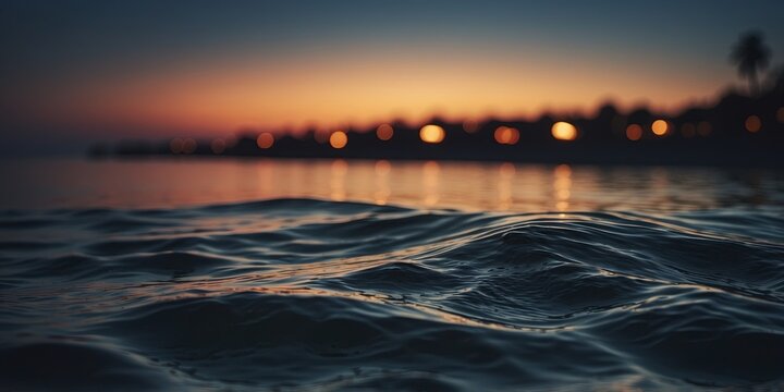 The tranquil waters of the ocean turn ominous as the darkness of night blankets the beach creating an unnerving contrast to the usually peaceful scene.