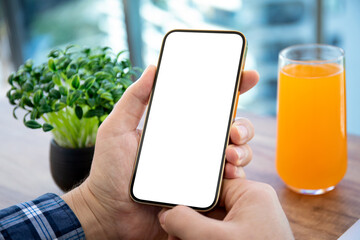 male hands holding phone with isolated screen background juice cafe