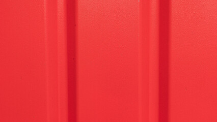 Texture of a red-coloured wooden wall.