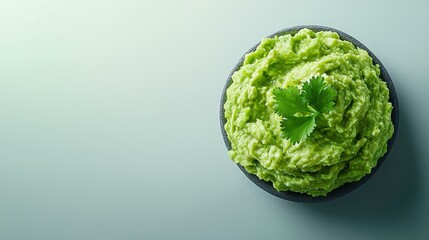 Vibrant Green Guacamole in Black Bowl with Cilantro Garnishing