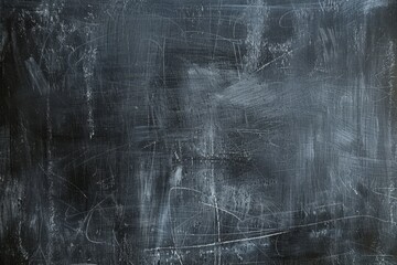 Fototapeta premium Chalk rubbed out on blackboard abstract educational background for banners and startups