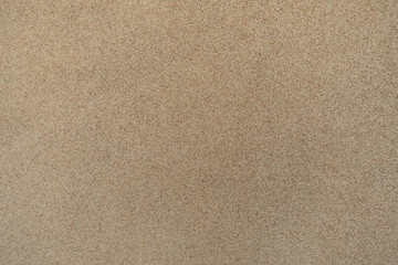 Rough surface of coarse beige and pink pebble dash finish