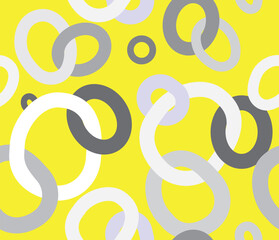 Abstract repeating pattern of rings on yellow background for textile printing